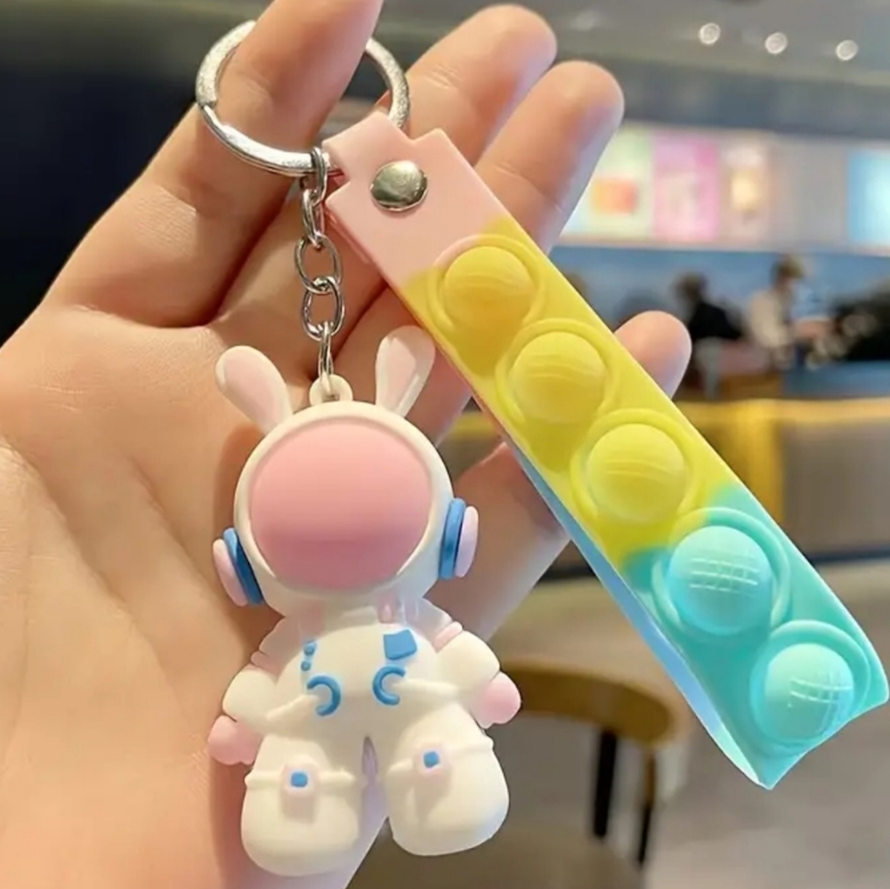 Spaceman Pop Bubble Keychain - Picture 9 of 13